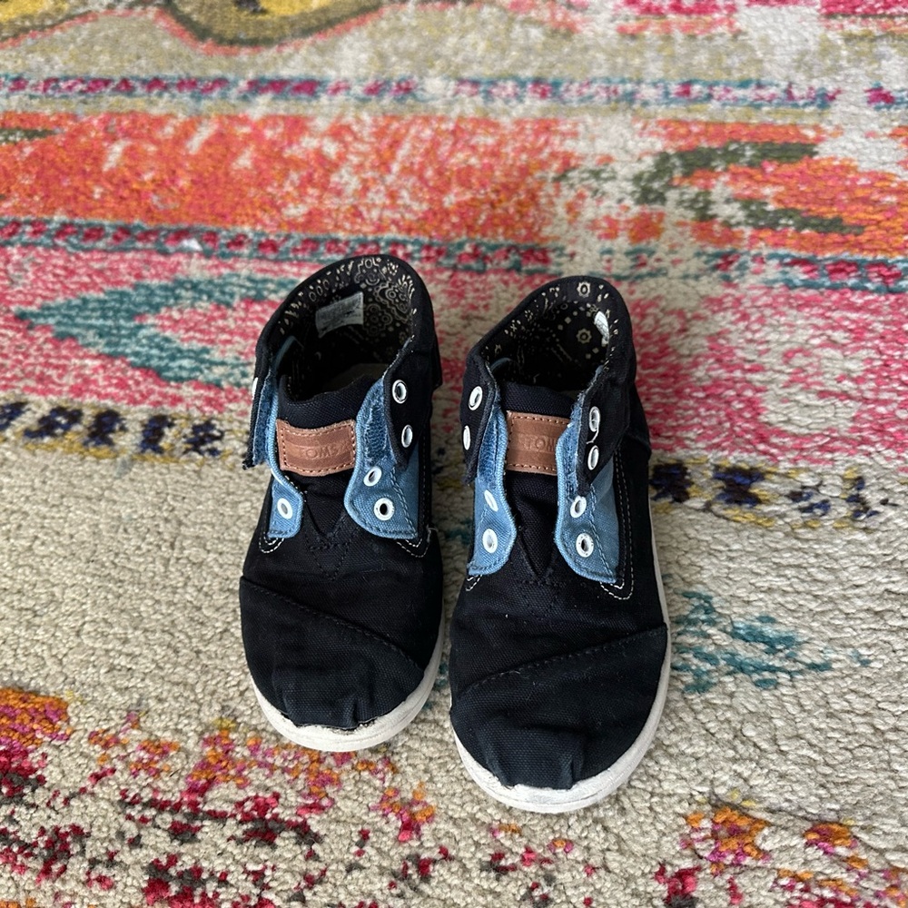 Tom’s black and denim high tops size toddler 10